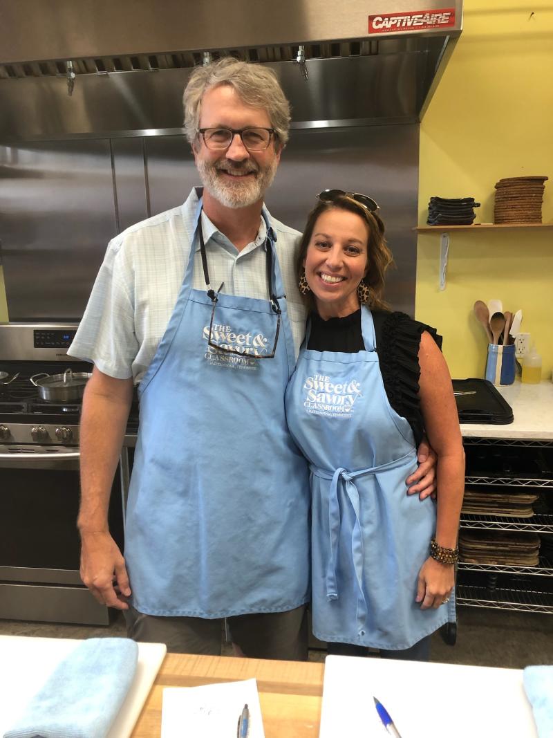 Fred and Jocelyn pose for a photo in the Sweet and Savory Classroom Kitchen
