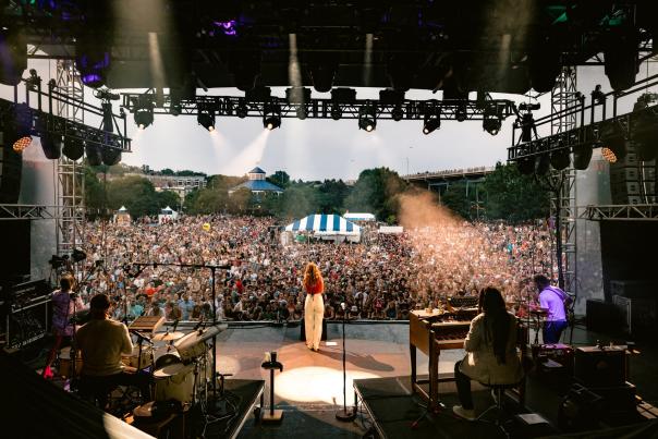 Image taken from behind performer (Lake Street Dive) on stage at Moon River Festival