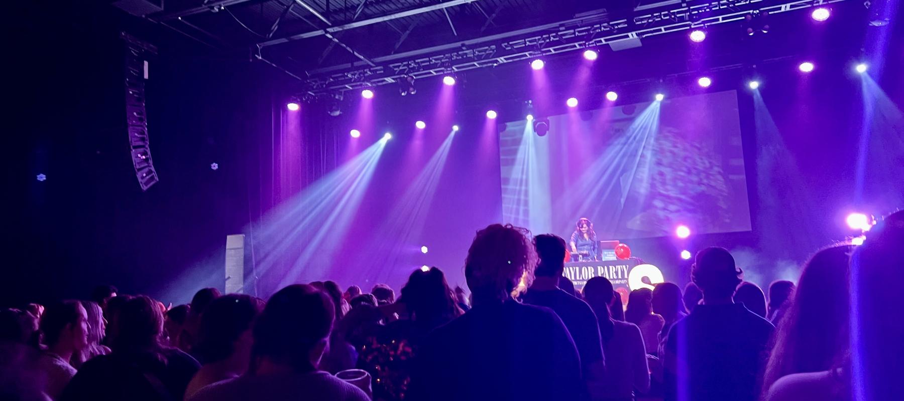 Crowd watching a performance on stage.